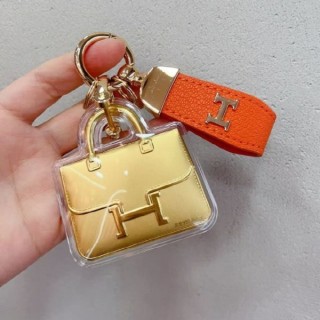 에* 오렌지 금가방 키링